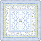 A square decorative textile or mat featuring a light blue geometric lattice pattern in the center, surrounded by white, pale green, and light blue floral and border motifs.